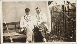 Sepia Photograph of Two Men on a Bench