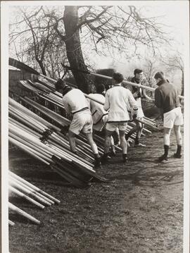 Photograph of Crew Members with Oars