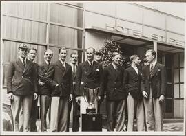 Photograph of a Jesus College Crew with Trophy