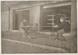 Photograph of Two Boys Playing Tug of War
