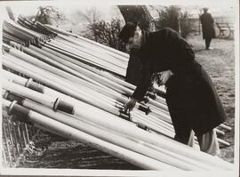 Photograph of Man with Oars
