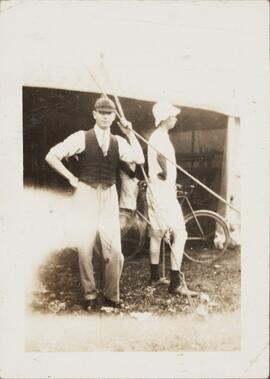 Photograph of Two Men Outside a Tent